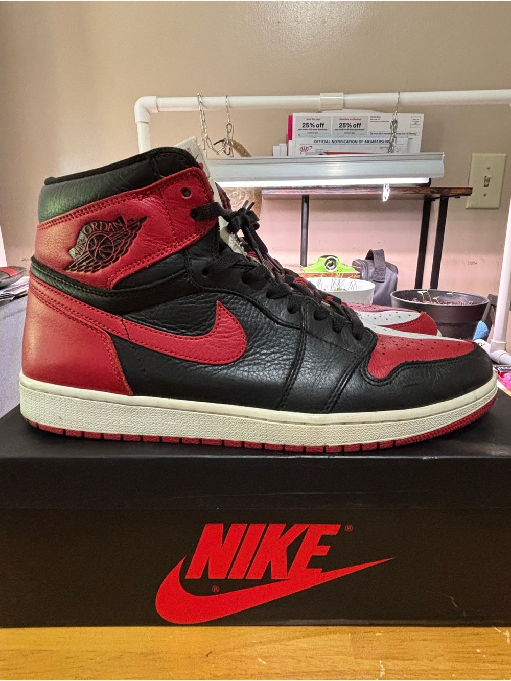Nike Air Jordan 1 High “Homage” - Black/Red with White Sneakers.